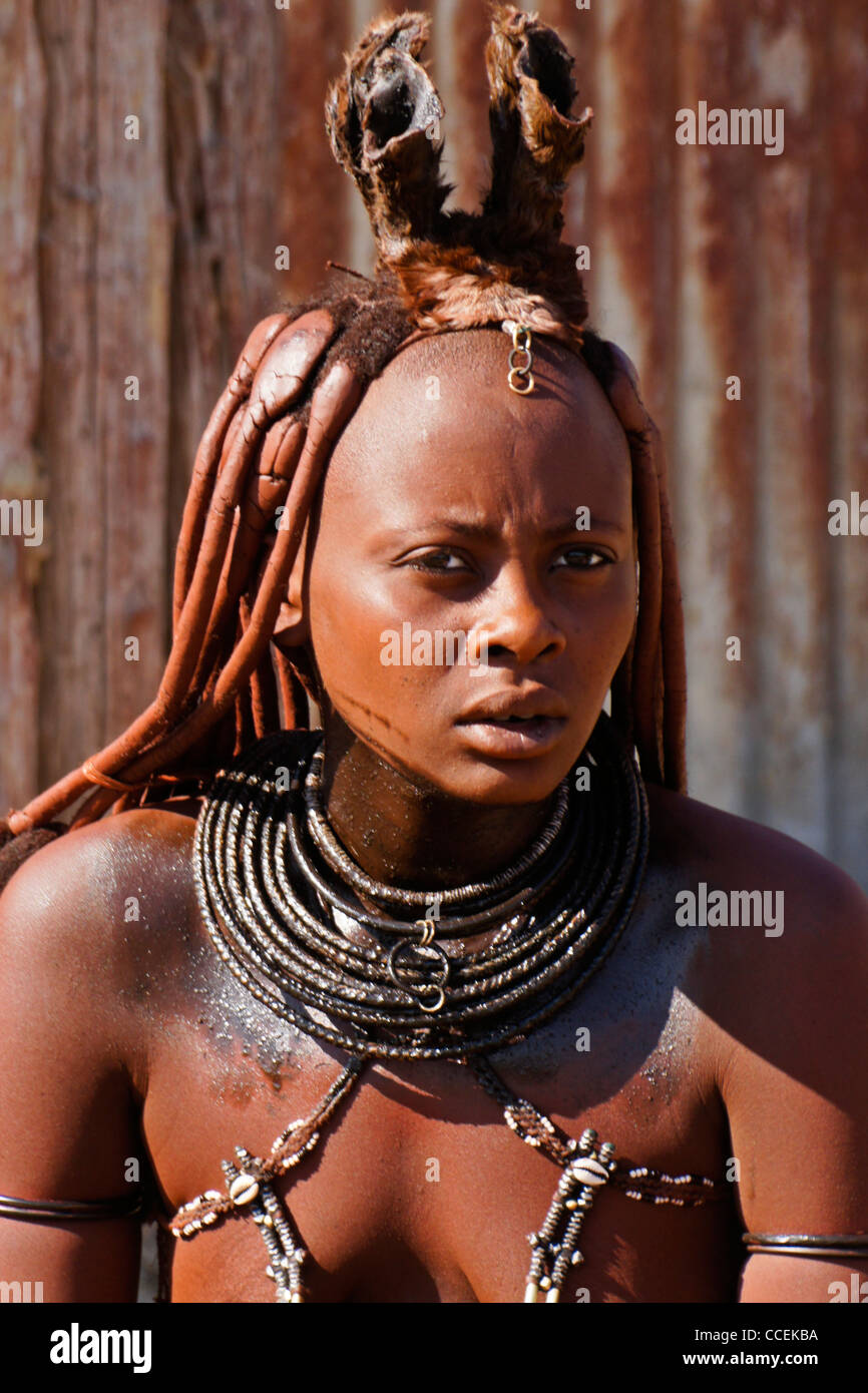 Married Himba woman with braided hair and erembe near Opuwo, Namibia Stock Photo