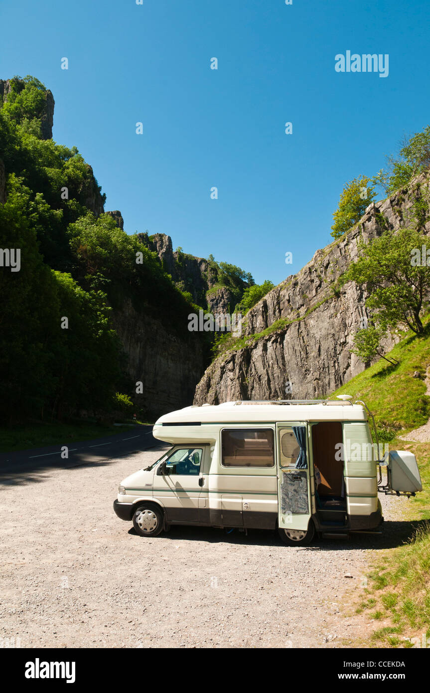 A motorhome parked in the world famous Cheddar Gorge in Somerset on a very sunny summer day. Stock Photo