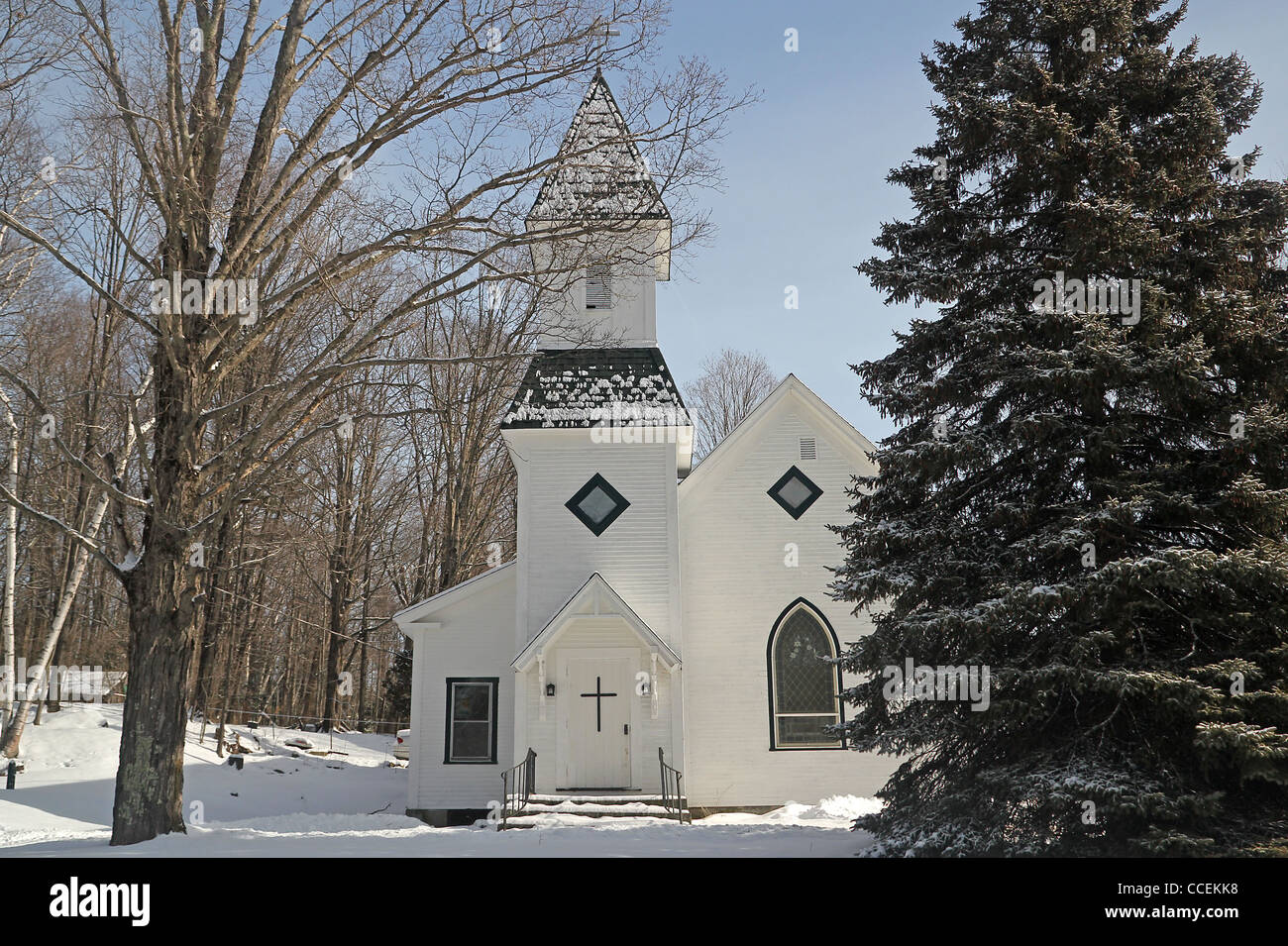 A winter view of a church in a small New England community Stock Photo