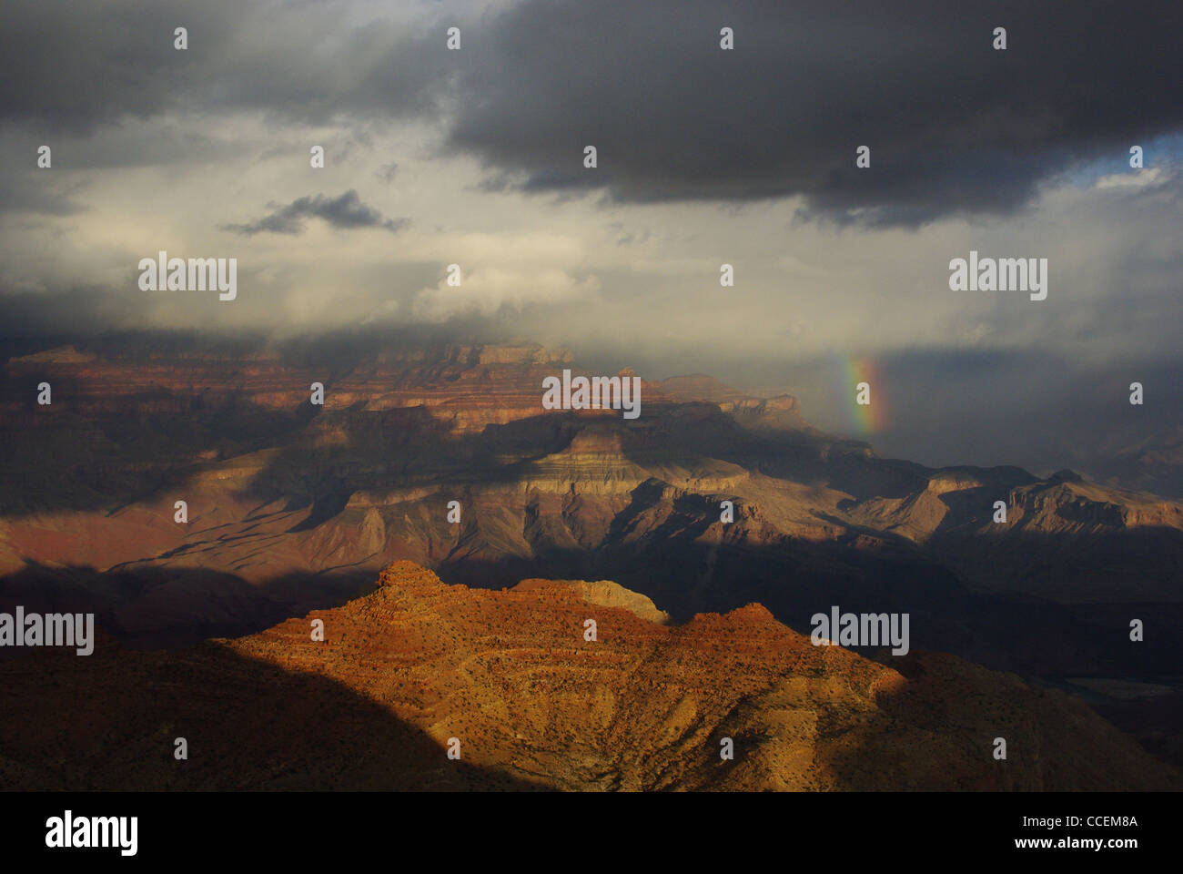 Rainbow, storm clouds and sun on Grand Canyon, Arizona Stock Photo - Alamy