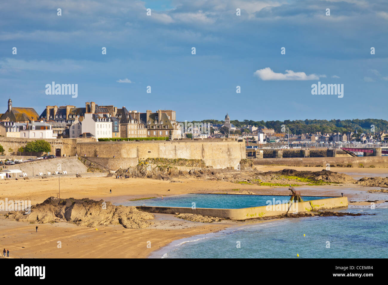 St Malo, Brittany, France, with its ramparts, one of its beaches and tidal bathing pool. Focus on foreground. Stock Photo