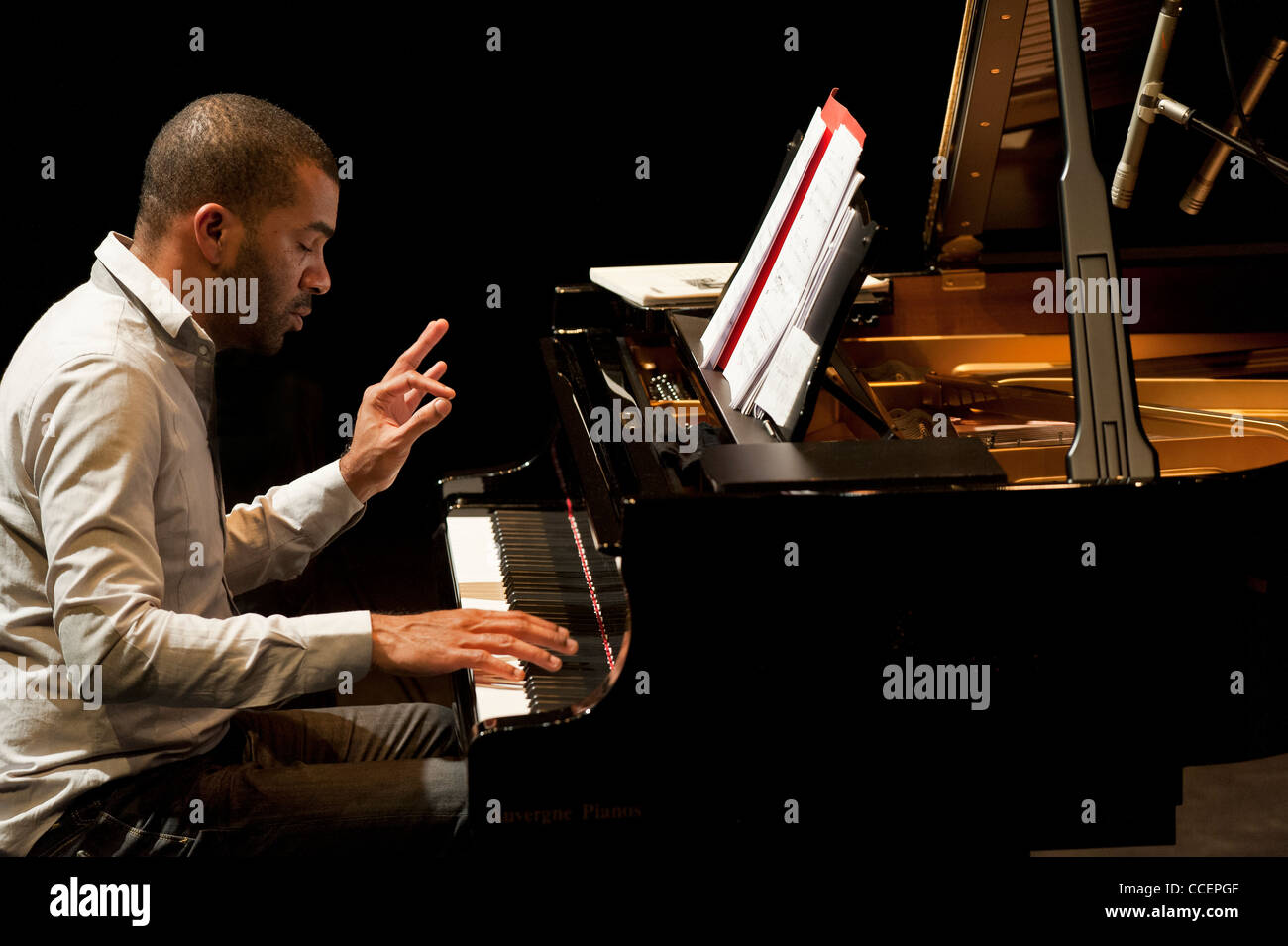 Wilhem LATCHOUMIA  playing grand piano in rehearsal. Stock Photo