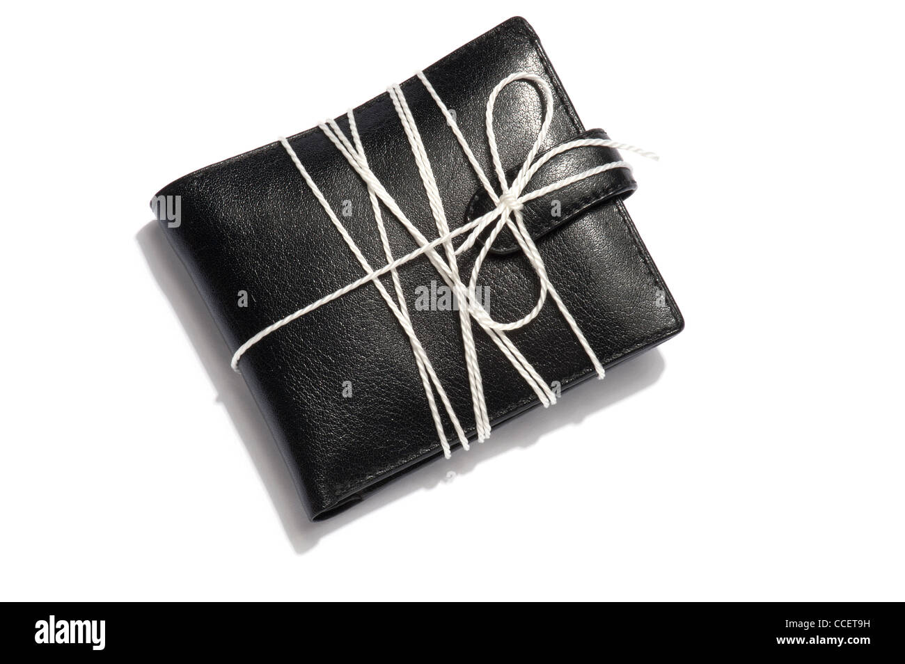 A black leather wallet with a string around it Stock Photo - Alamy