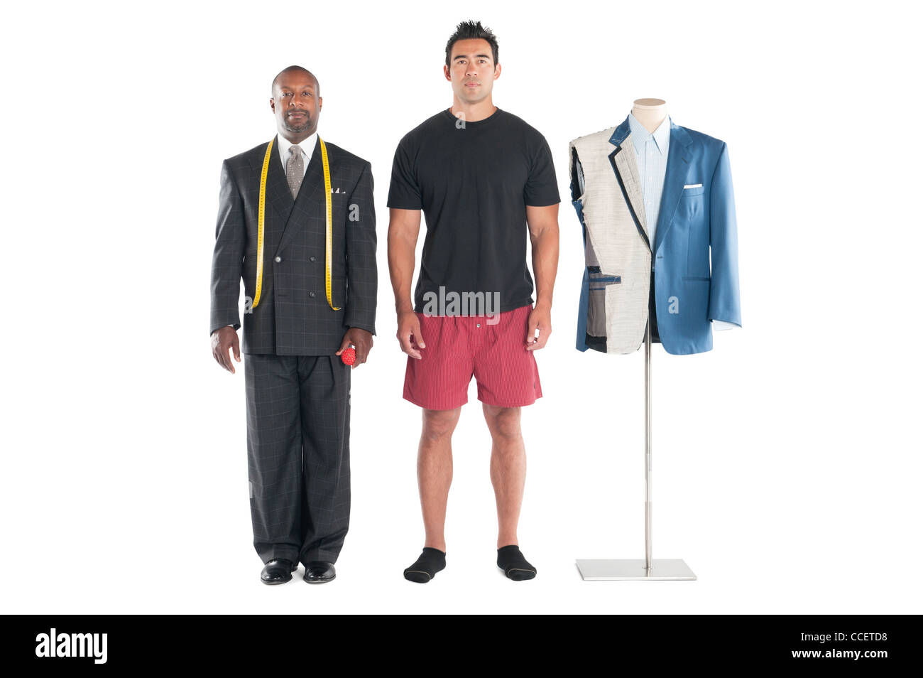 Portrait of tailor standing with customer over white background Stock Photo