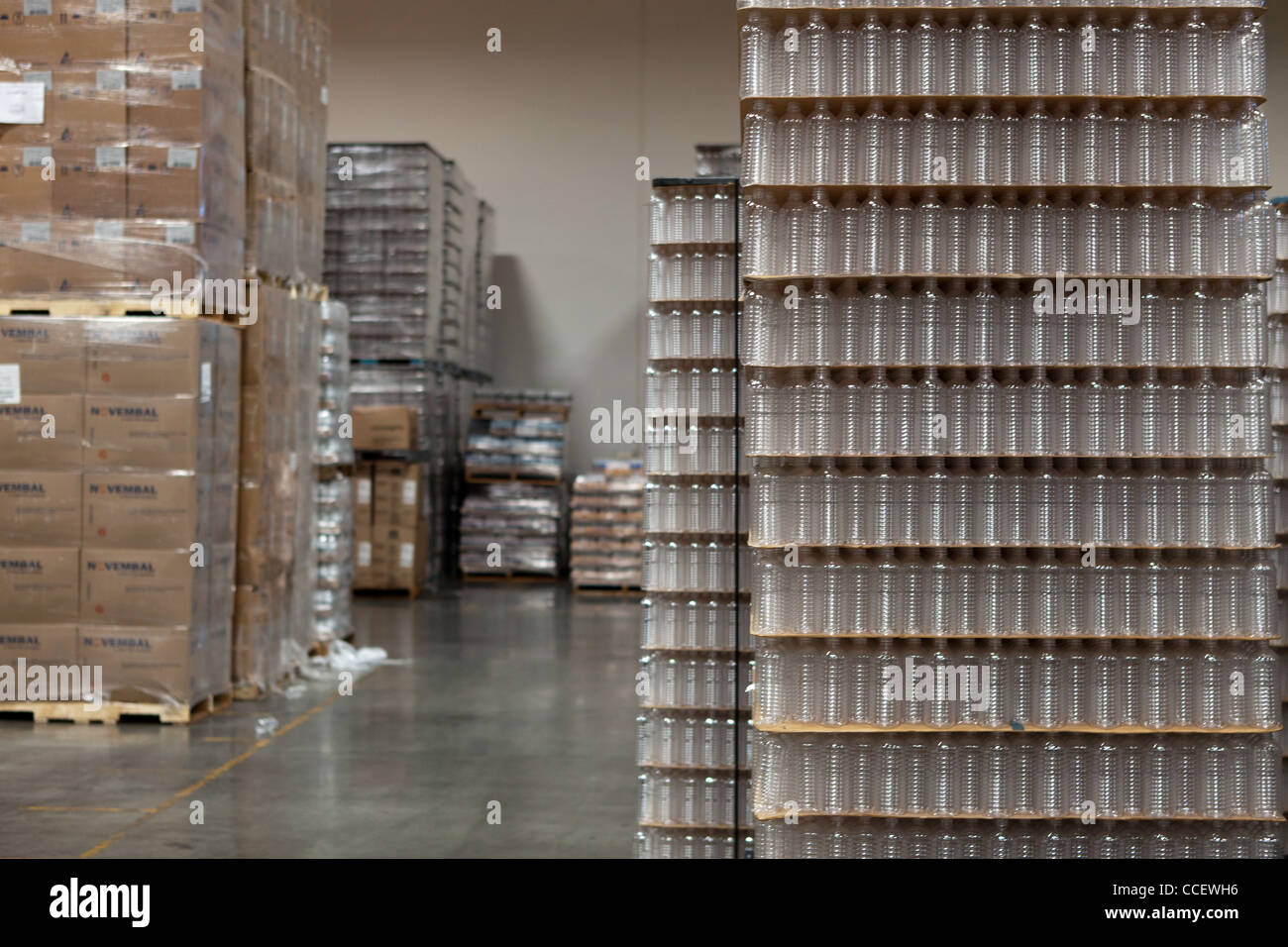 Packed bottled water kept in warehouse Stock Photo Alamy