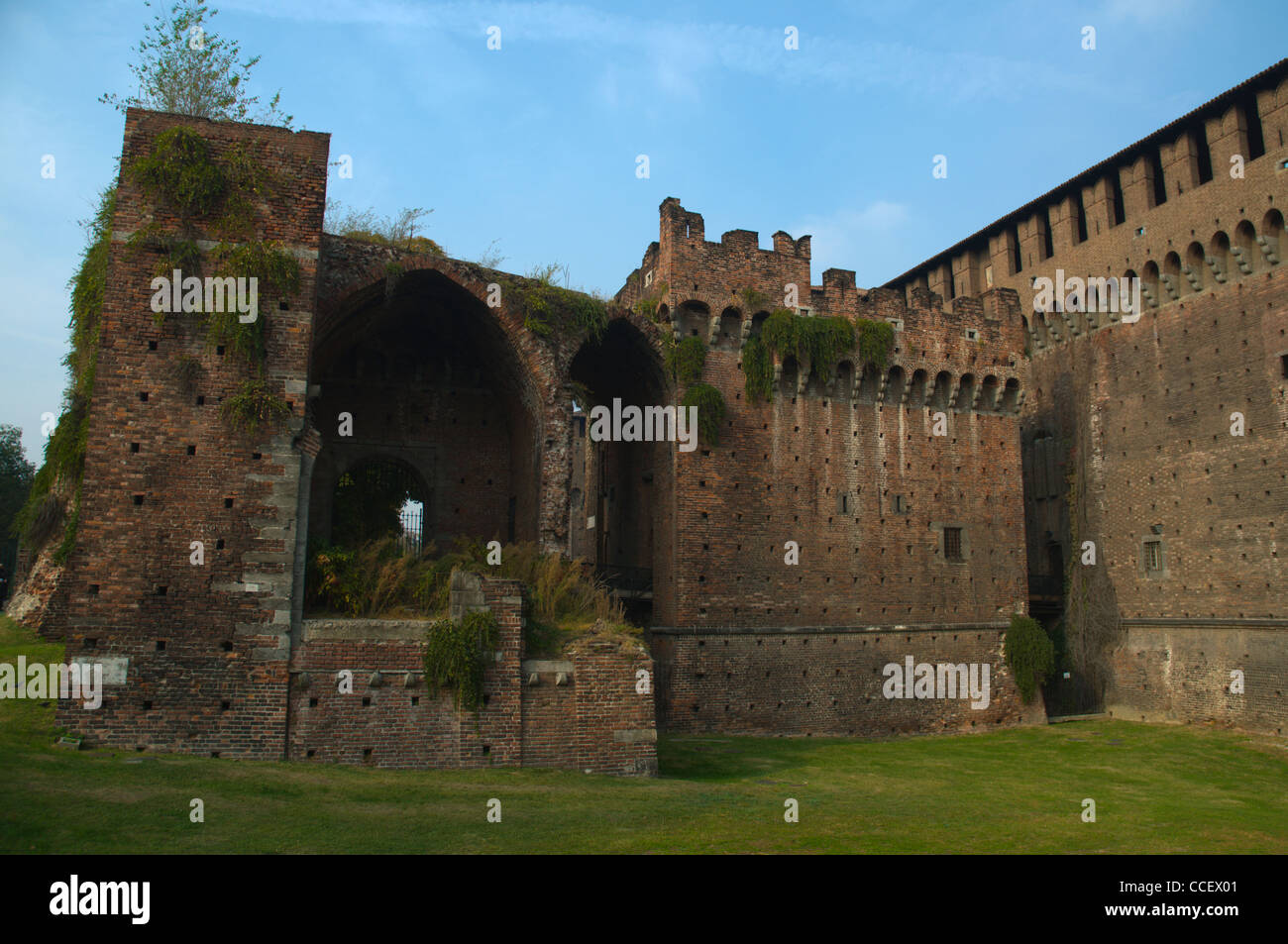 Moats dried by Napoleon in early 18th century encircling the walls of Castello Sforzesco castle Milan Lombardy region Italy Stock Photo
