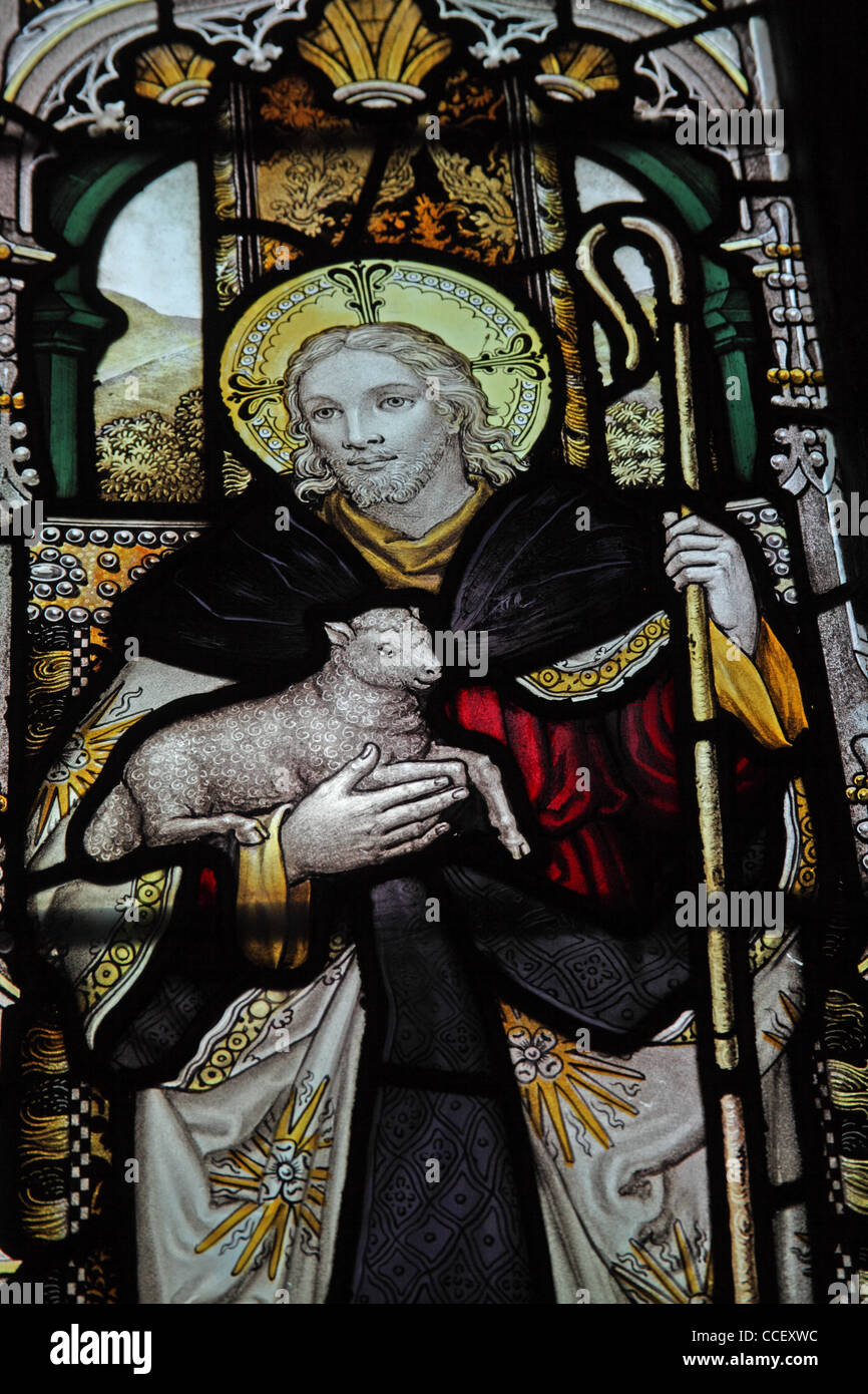 A stained glass window by C E Kempe & Co. depicting The Good Shepherd, All Saints Church, Hough-on-the-Hill, Lincolnshire Stock Photo