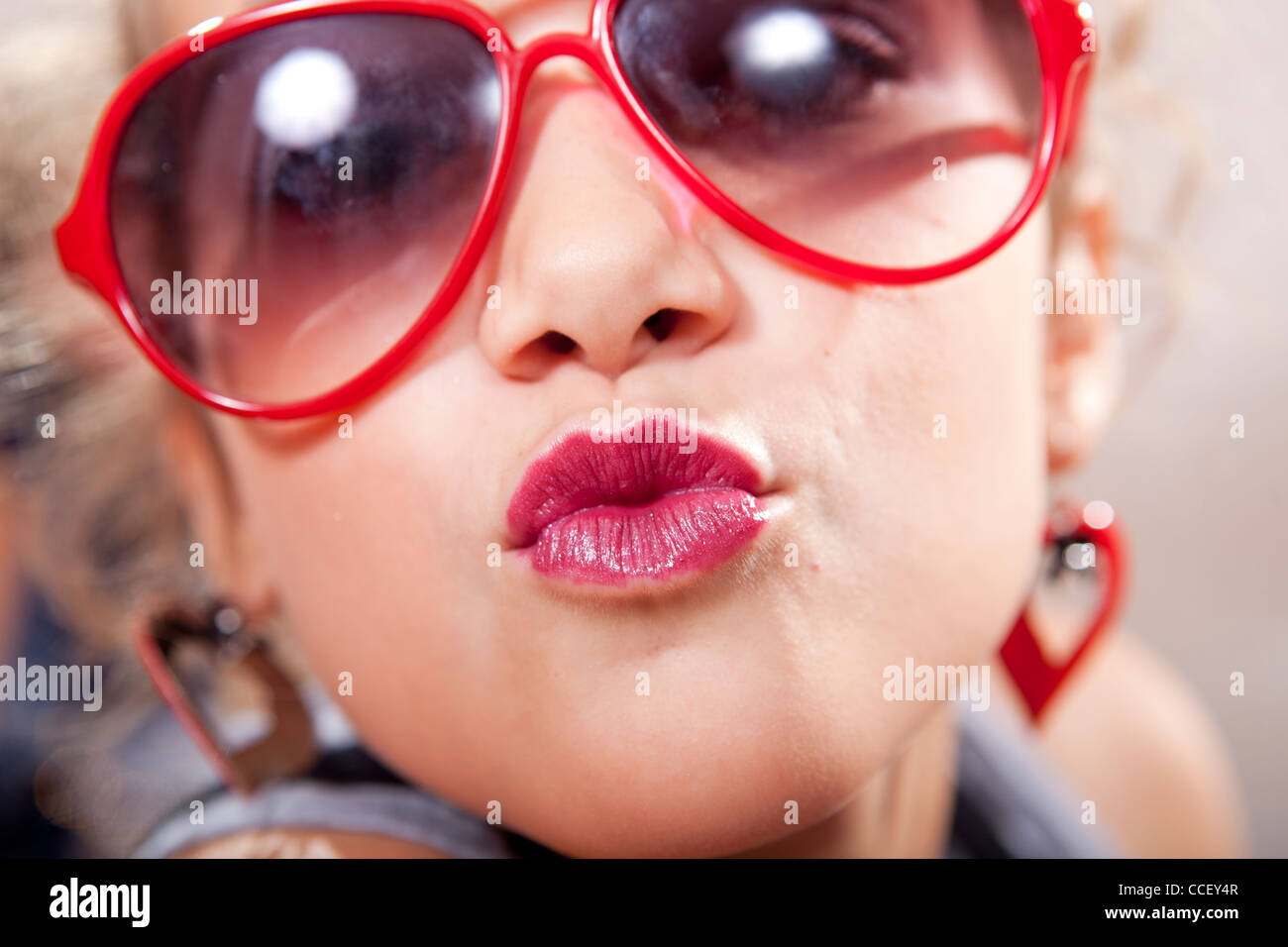 Young teenage sending a kiss face closeup Stock Photo Alamy
