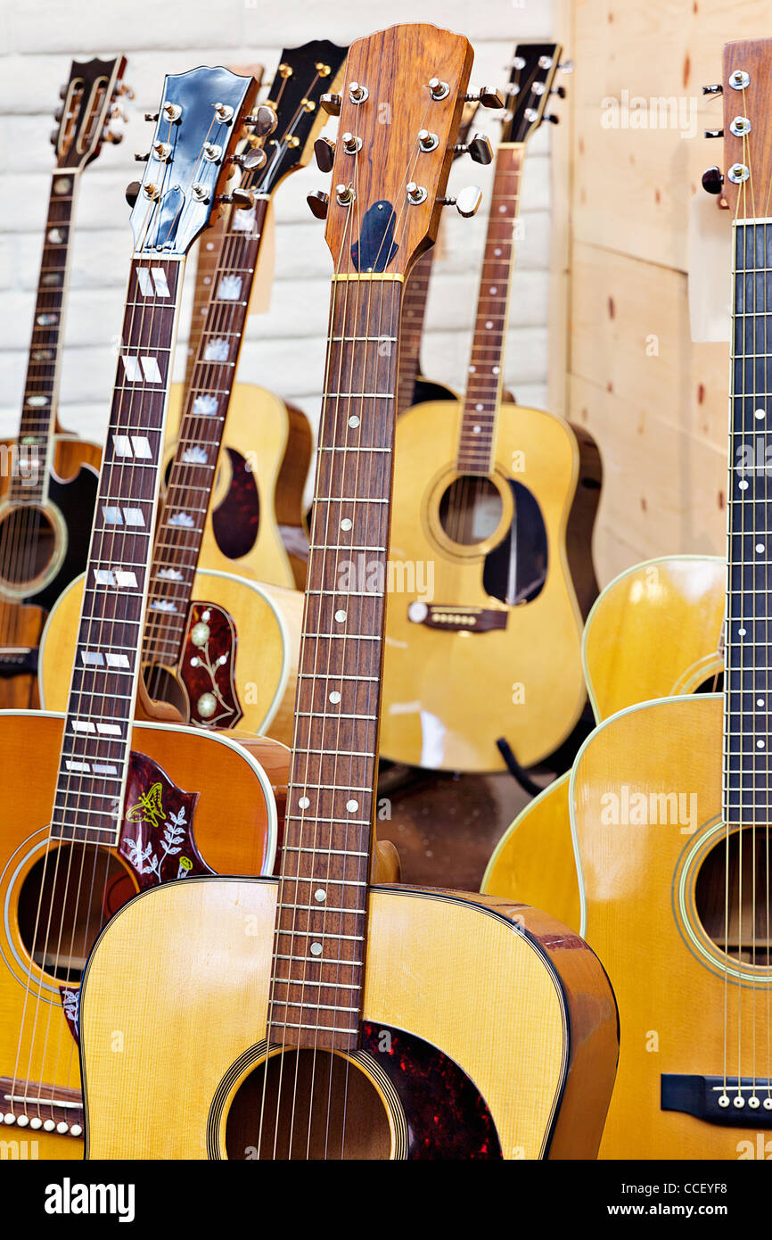 Guitars at music store Stock Photo
