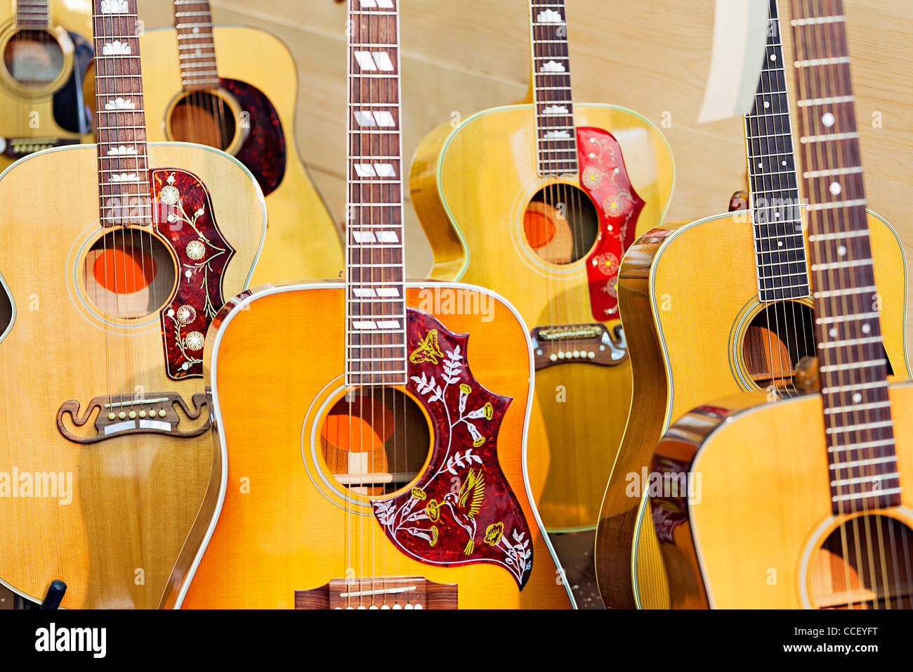 Collection of electric guitars at music store Stock Photo