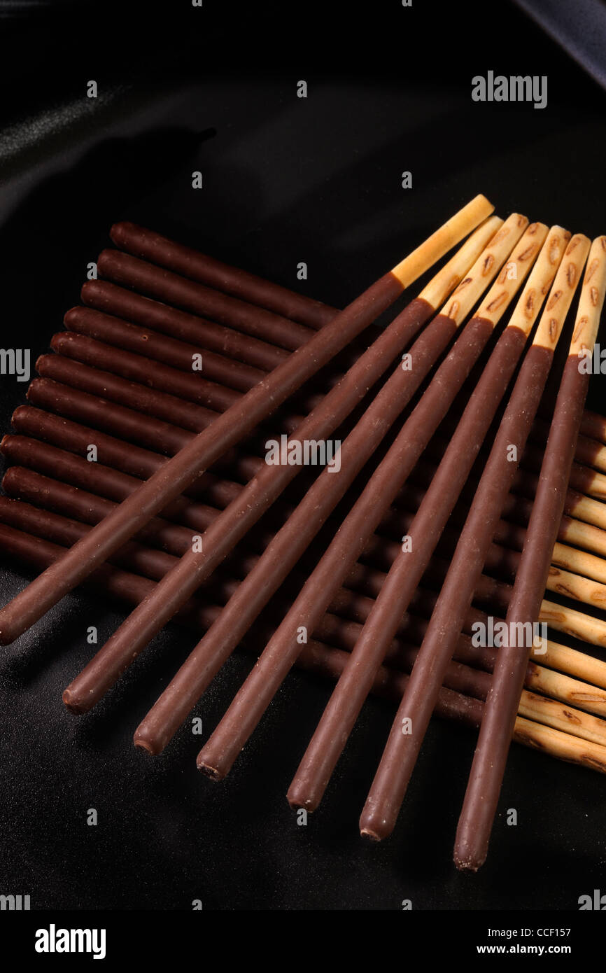 Chocolate covered sticks Stock Photo