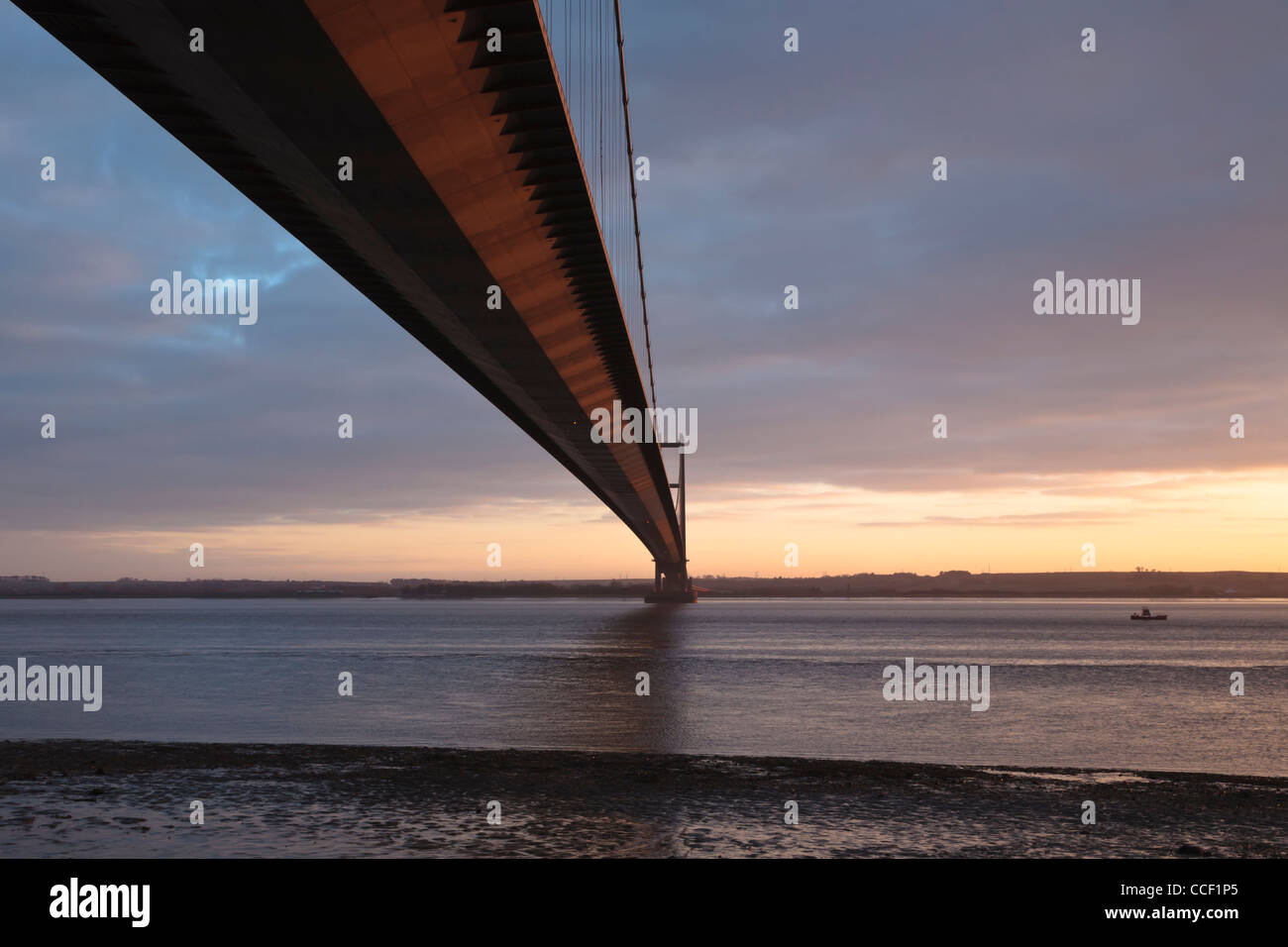 The Humber Bridge seen from the north bank at sunset in January Stock Photo