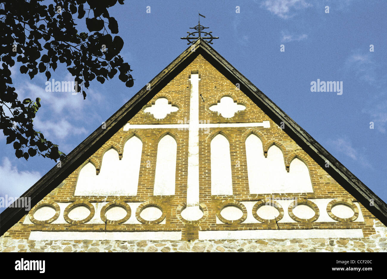 Architectural detail showing the roof peak of the 14th century medieval Saint Michael Church of Pernå, Finland Stock Photo