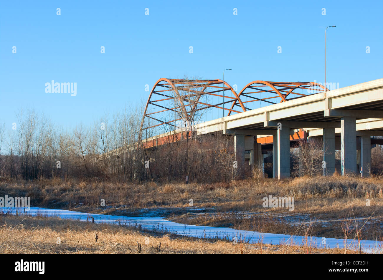Cedar Avenue or Highway 77 twin bridge decks spanning Minnesota River from Black Dog Preserve in Eagan Minnesota Stock Photo