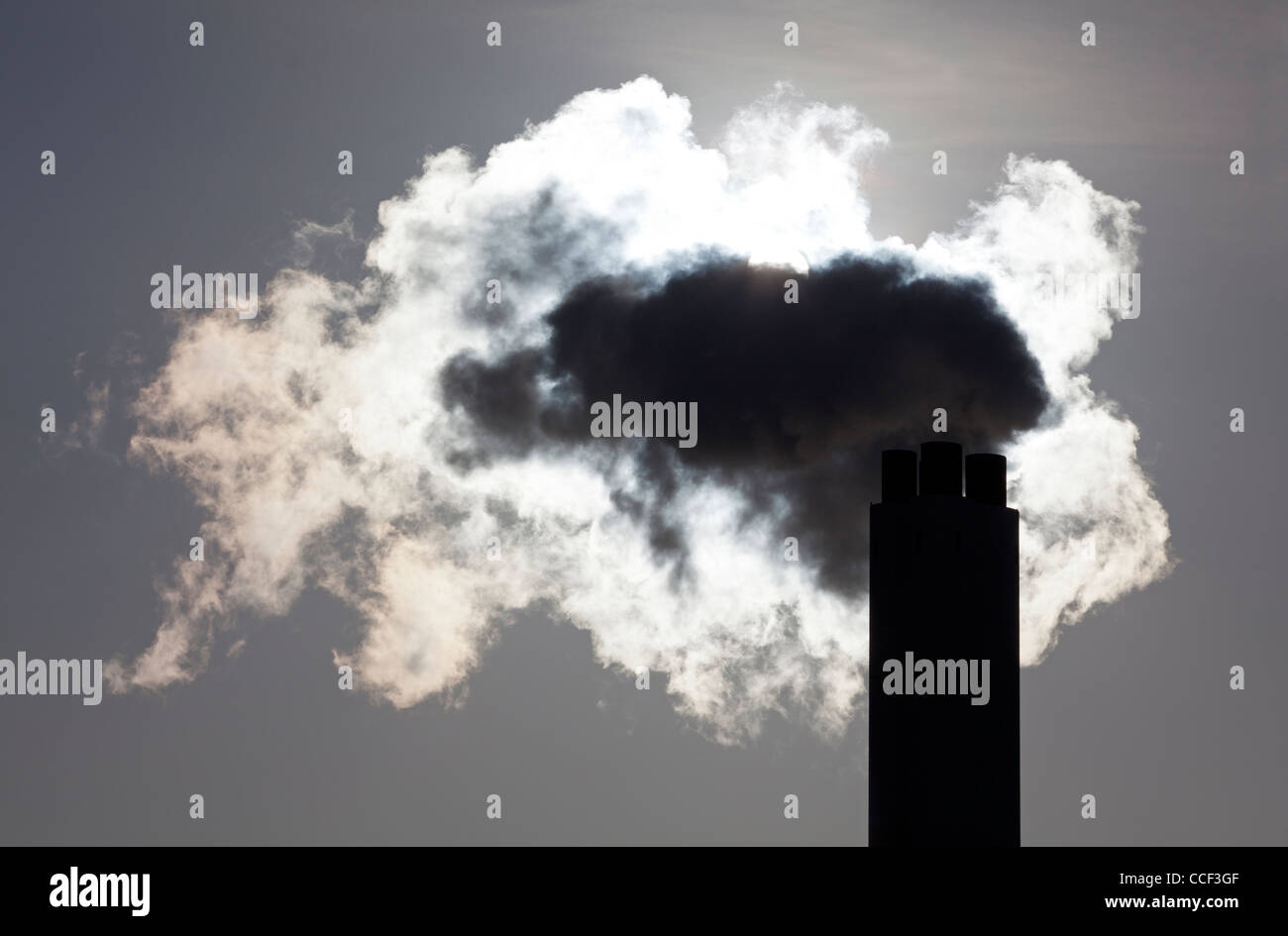 Smoking smokestack Stock Photo