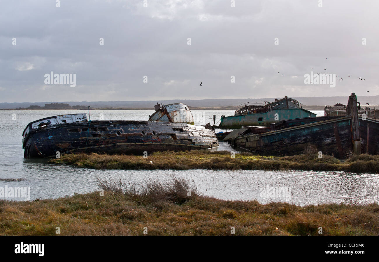 The remains of wrecked wooden boat on the foreshore of the River Medway Stock Photo