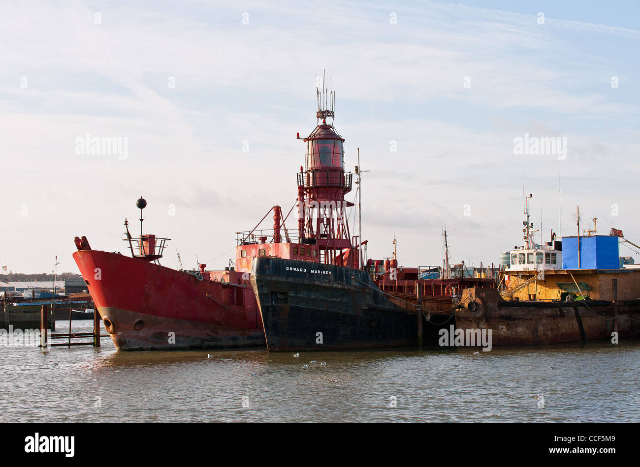 A disused lightship and other craft moored on the River Medway Stock Photo