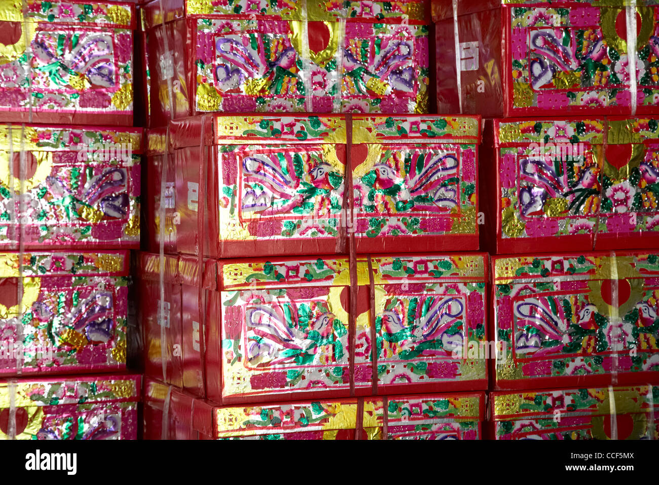 large paper imitation gift wrapped presents which can be burned as offerings to the dead po fook hill cemetery sha tin Stock Photo