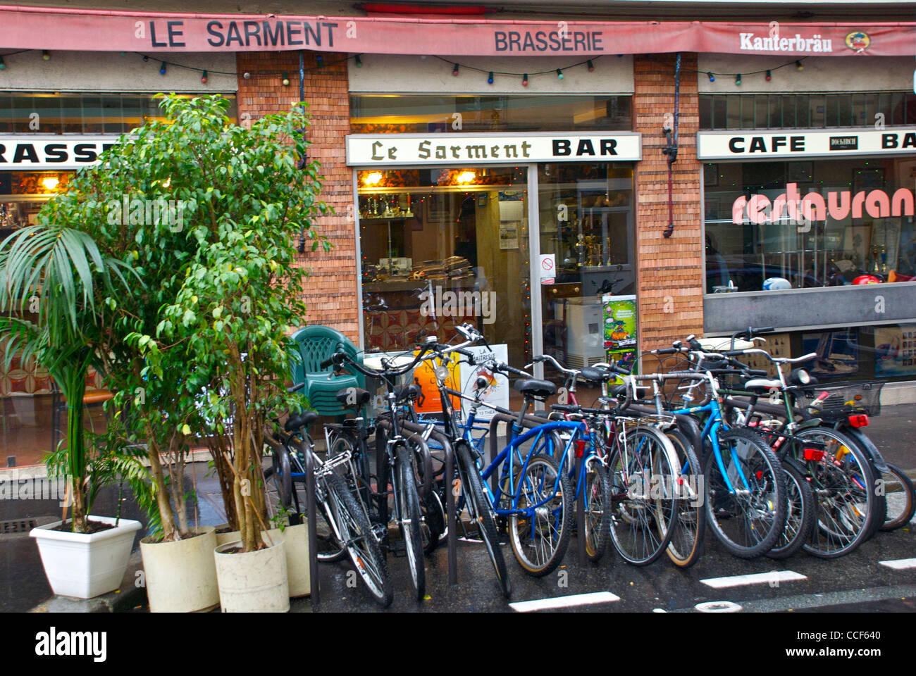 Bicycles outside cafe in Paris, France Dec 2011 Stock Photo Alamy