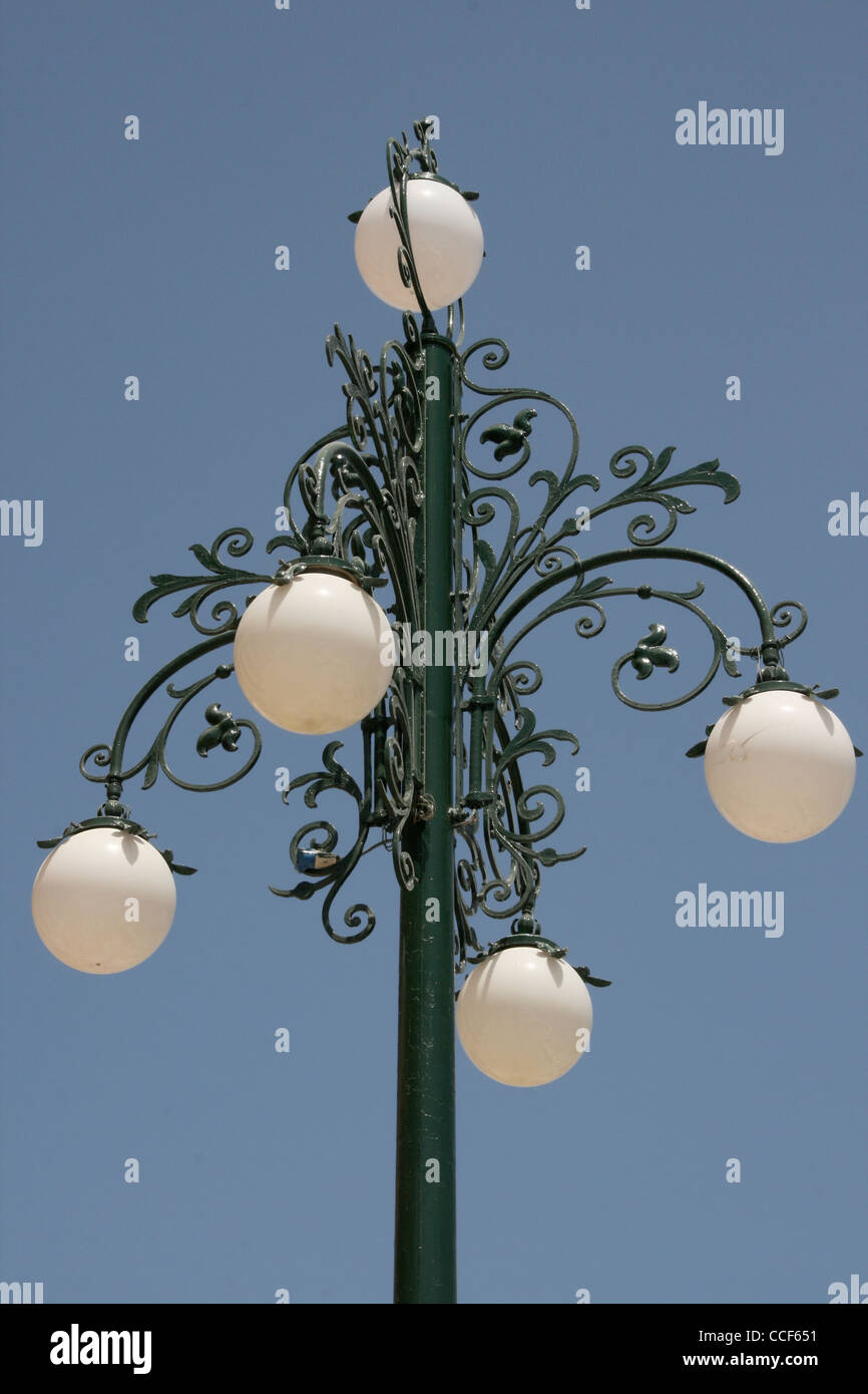 Ornate green iron street lamps outside the Mosta Dome in Malta Stock