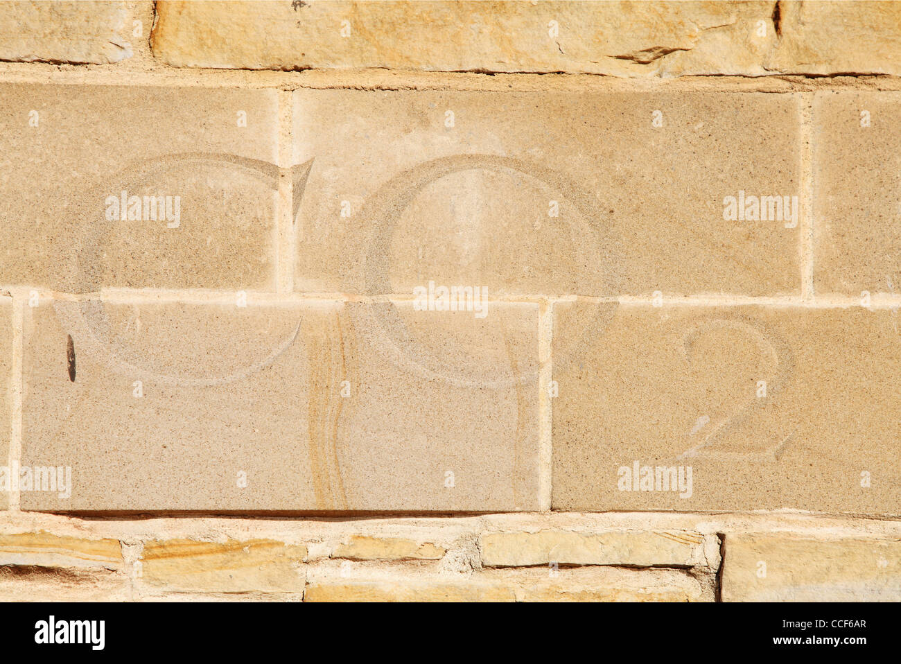 Carbon dioxide letters CO2 carved in stone old lime kilns Sunderland north east England UK Stock Photo