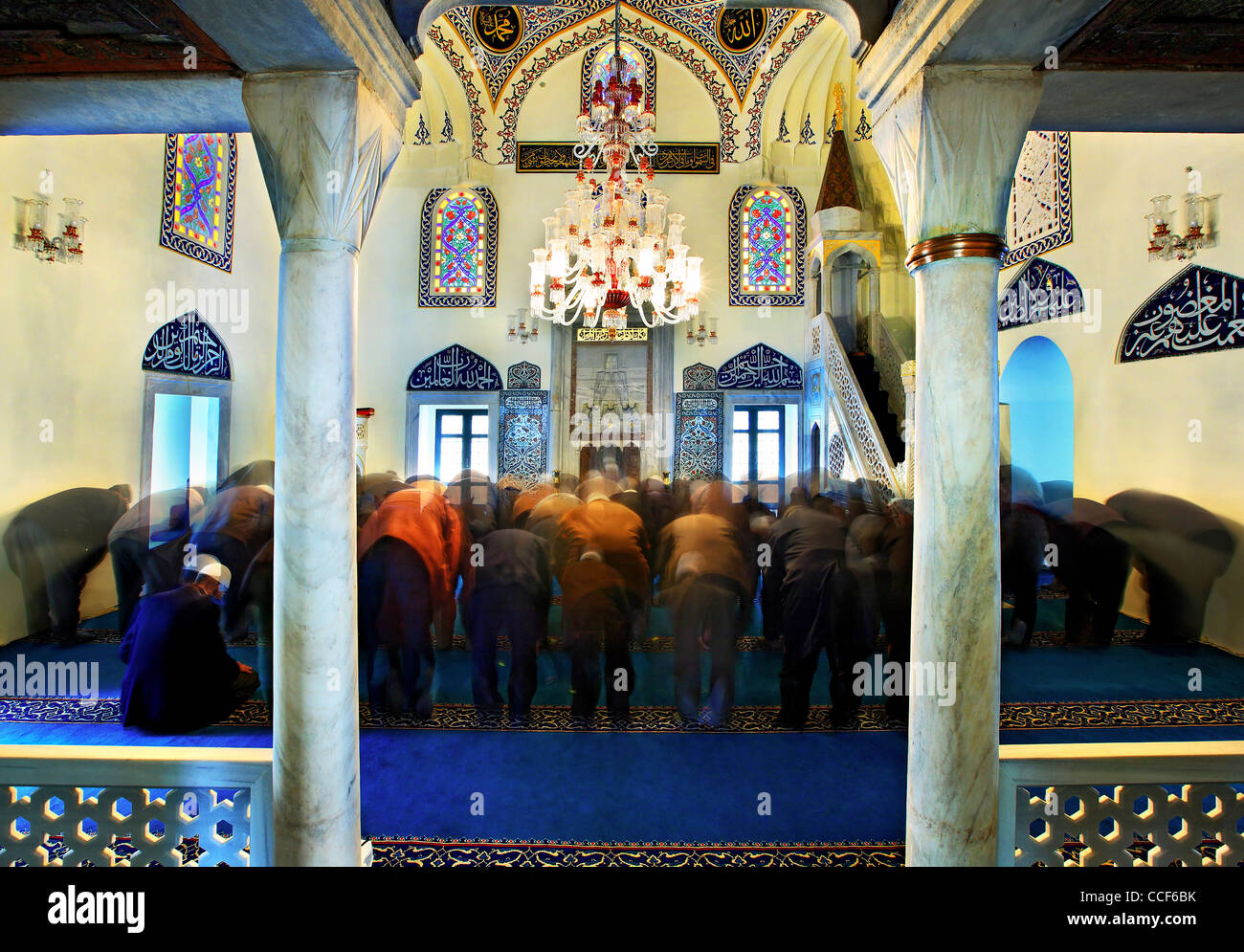 Greek Muslims praying inside Yeni Camii (it means 'New Mosque'), Komotini town, Rodopi prefecture, Thrace, Greece Stock Photo