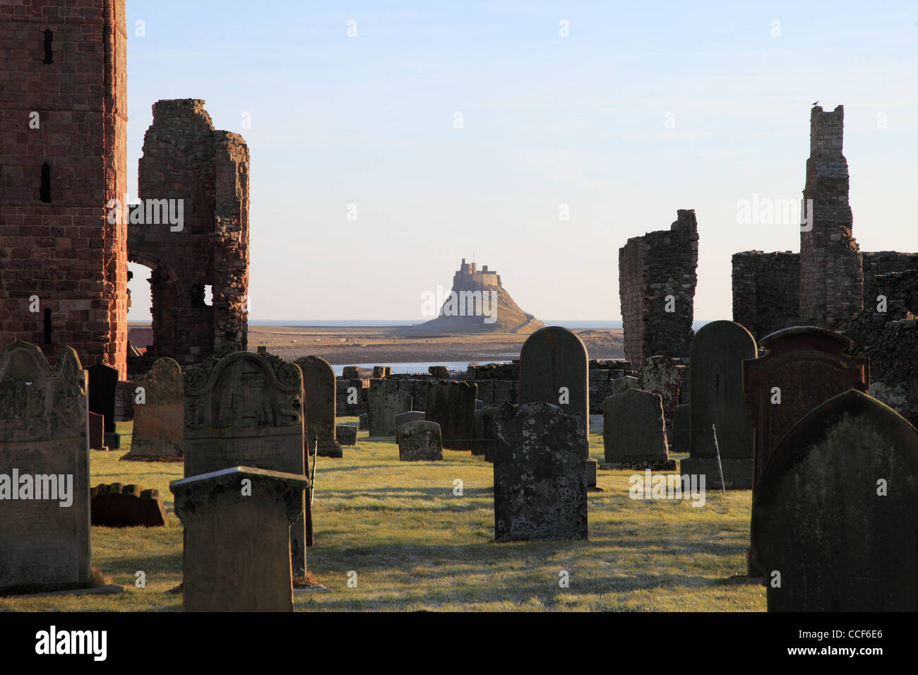 Lindisfarne castle from the Abbey churchyard Holy Island, north east England, UK Stock Photo