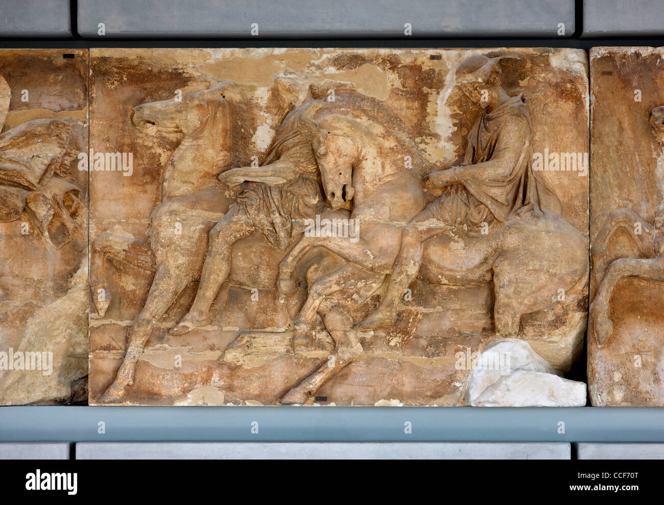 'Detail' from the frieze of the Parthenon, from the Parthenon gallery on the 3rd floor of the Acropolis museum, Athens, Greece. Stock Photo