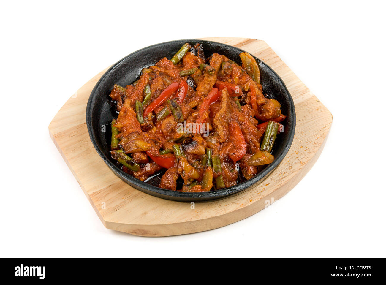 Roasted meat with vegetables at pan on a white background Stock Photo ...