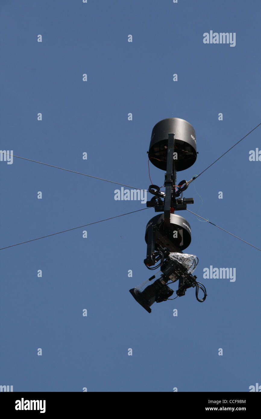 overhead tv camera on wire at sports event Stock Photo Alamy
