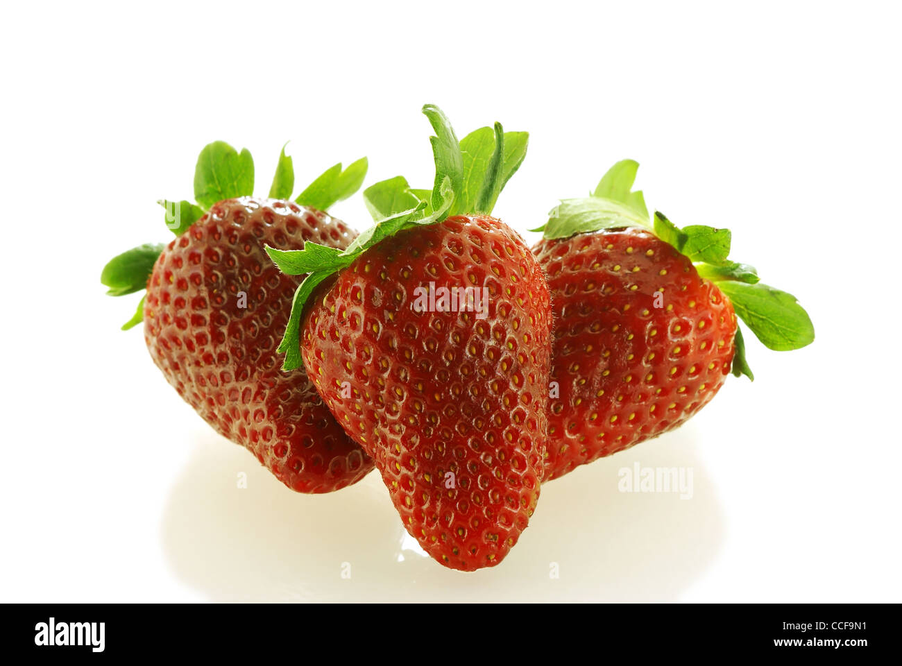 tree fresh ripe strawberries over white background Stock Photo - Alamy