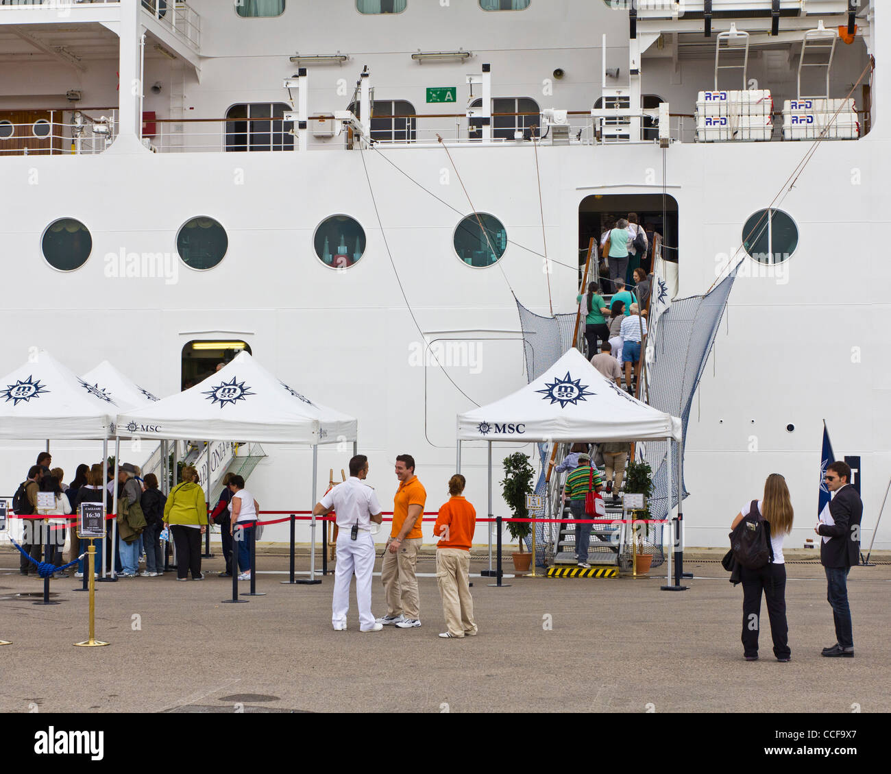 Passengers embarking MSC Armonia at Cagliari, Italy Stock Photo