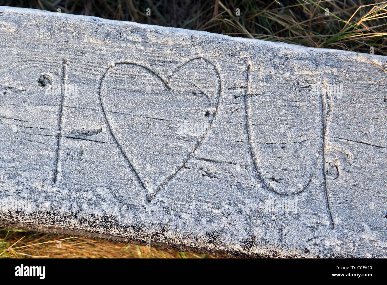 Romantic message writtin in ice / frost, 'I heart/love you', Suffolk Heritage Coast, Aldeburgh, UK Stock Photo