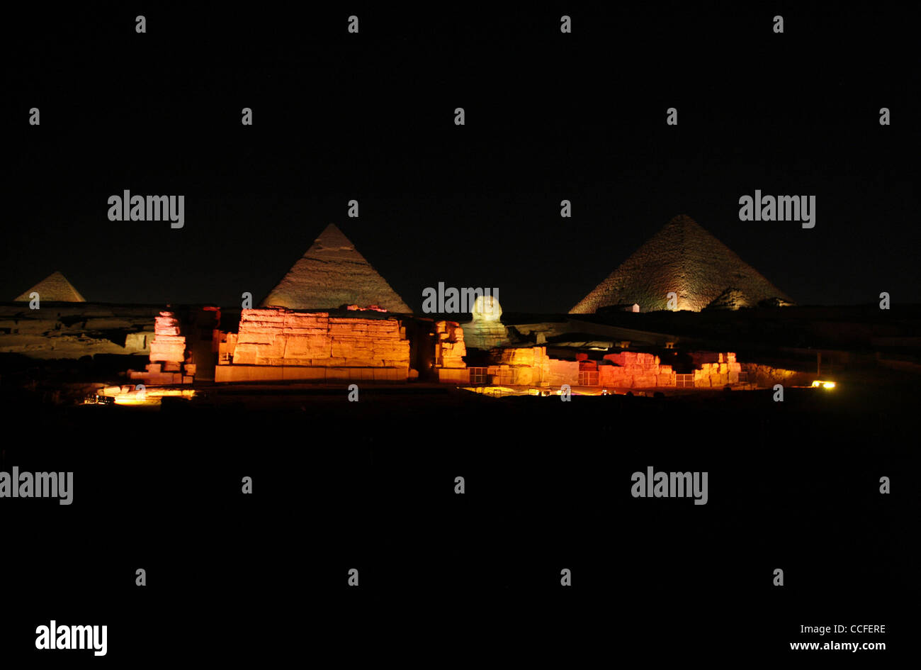 Pyramids and a sphinx at night in giza hi-res stock photography and ...