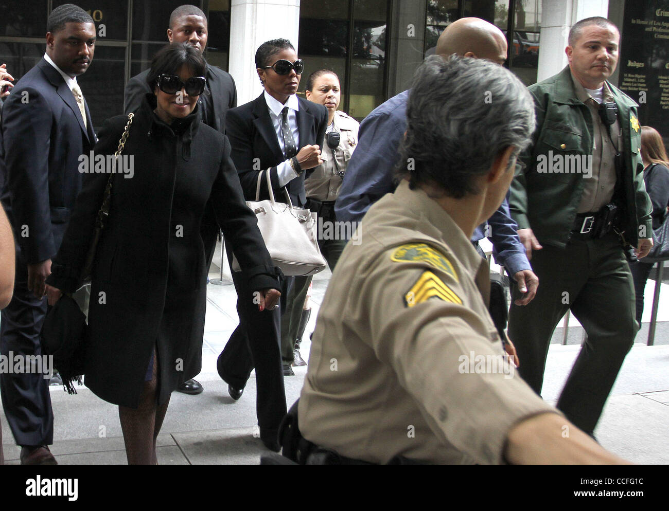 Jan. 5, 2011 - Los Angeles, California, U.S - JANET JACKSON (center, white purse), departs during the lunch break at the Criminal Courts Building for the preliminary hearing of Dr. Conrad Murray in the death Michael Jackson. (Credit Image: © Jonathan Alcorn/ZUMAPRESS.com) Stock Photo