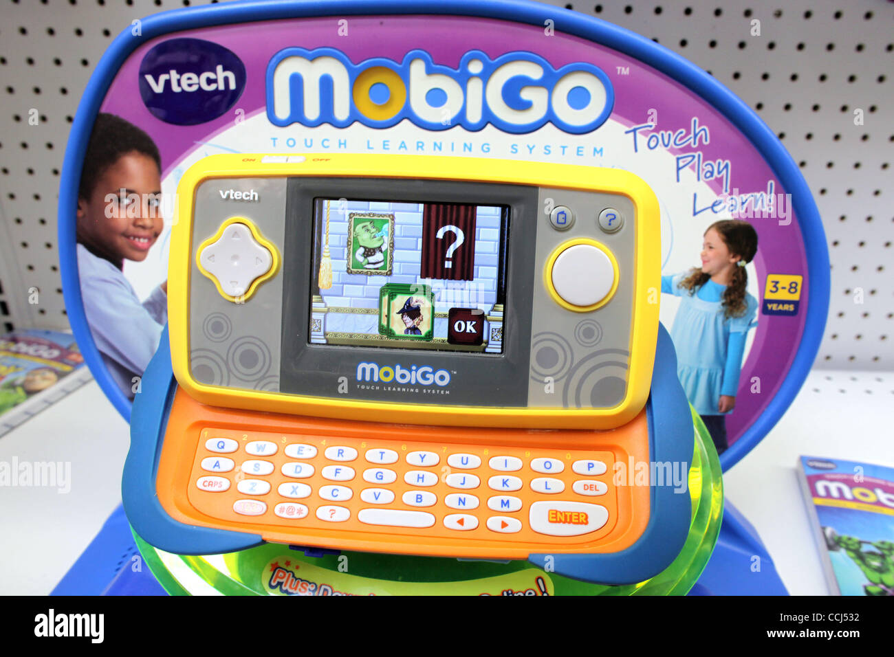 Dec 12, 2010 - Laguna Niguel, California, U.S. - MobiGo Touch Learning System. Another must-have on the kids' Christmas list is the MobiGo Touch. It looks like a cool hand-held video game, but it helps kids learn spelling, math and problem-solving. MobiGo Touch Learning System, also by V Tech, gives Stock Photo