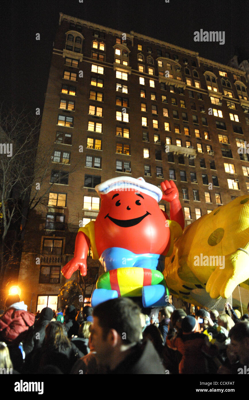 Nov. 24, 2010 - New York, New York, United States of America - The multiple story high Kool Aid Man balloon is fully inflated in front of a large building as crowds watch during the Macys Thanksgiving Day Parade inflation event. (Credit Image: © Andrew Fielding/Southcreek Global/ZUMAPRESS.com) Stock Photo