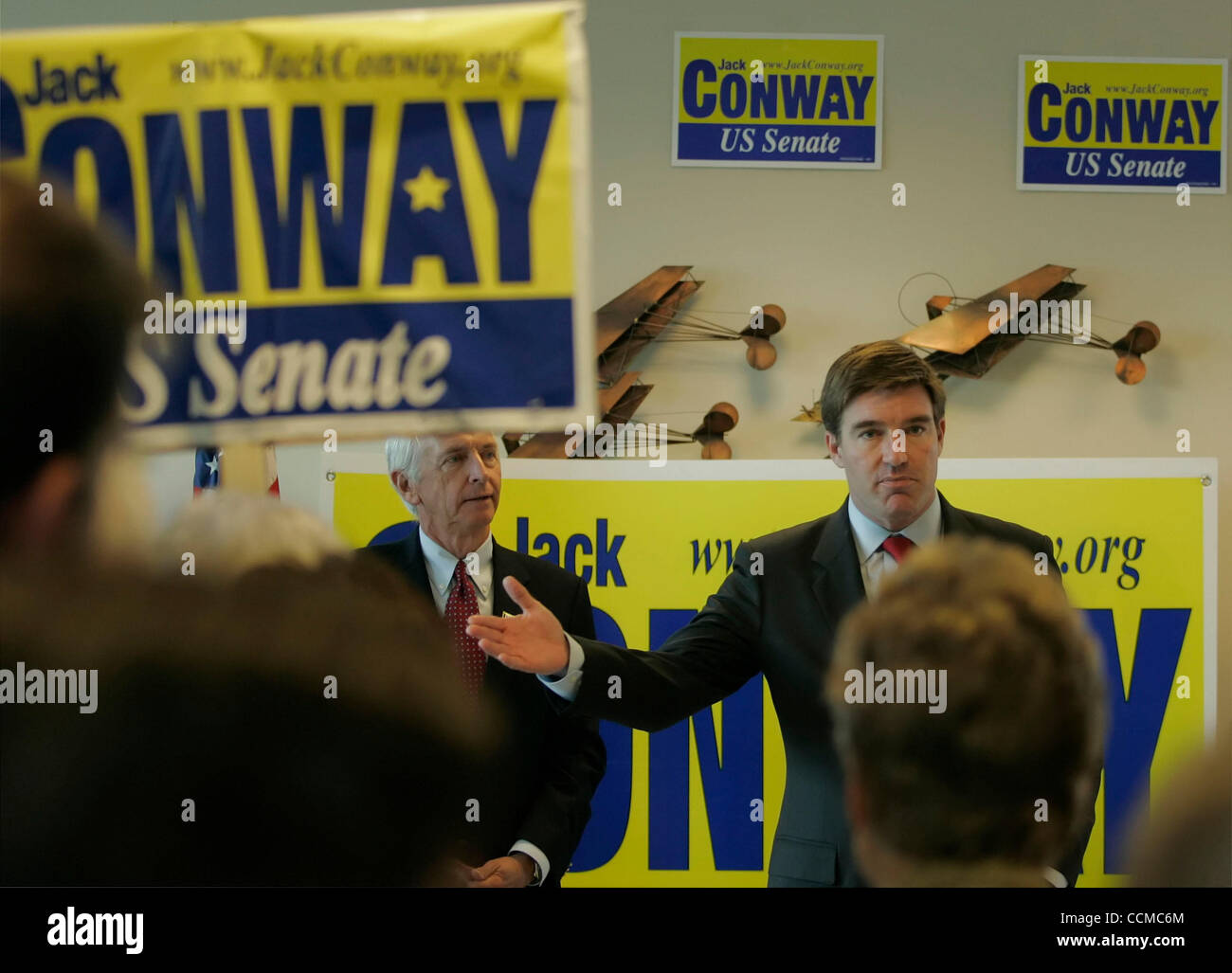 Democratic Senate nominee JACK CONWAY (right) addresses supporters with Governor STEVE BESHEAR looking on during a campaign rally at the Bowling Green-Warren County Regional Airport. Both Conway and his opponent spent the day before the general election doing fly-around tours of the state. Stock Photo