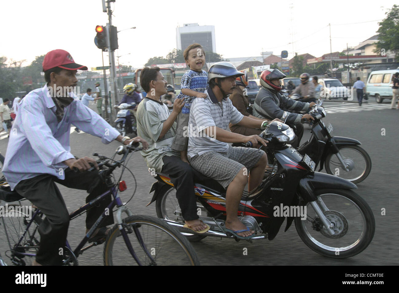 Person Riding Without Helmet Motorbike rider without helmet hi-res stock photography and images - Alamy
