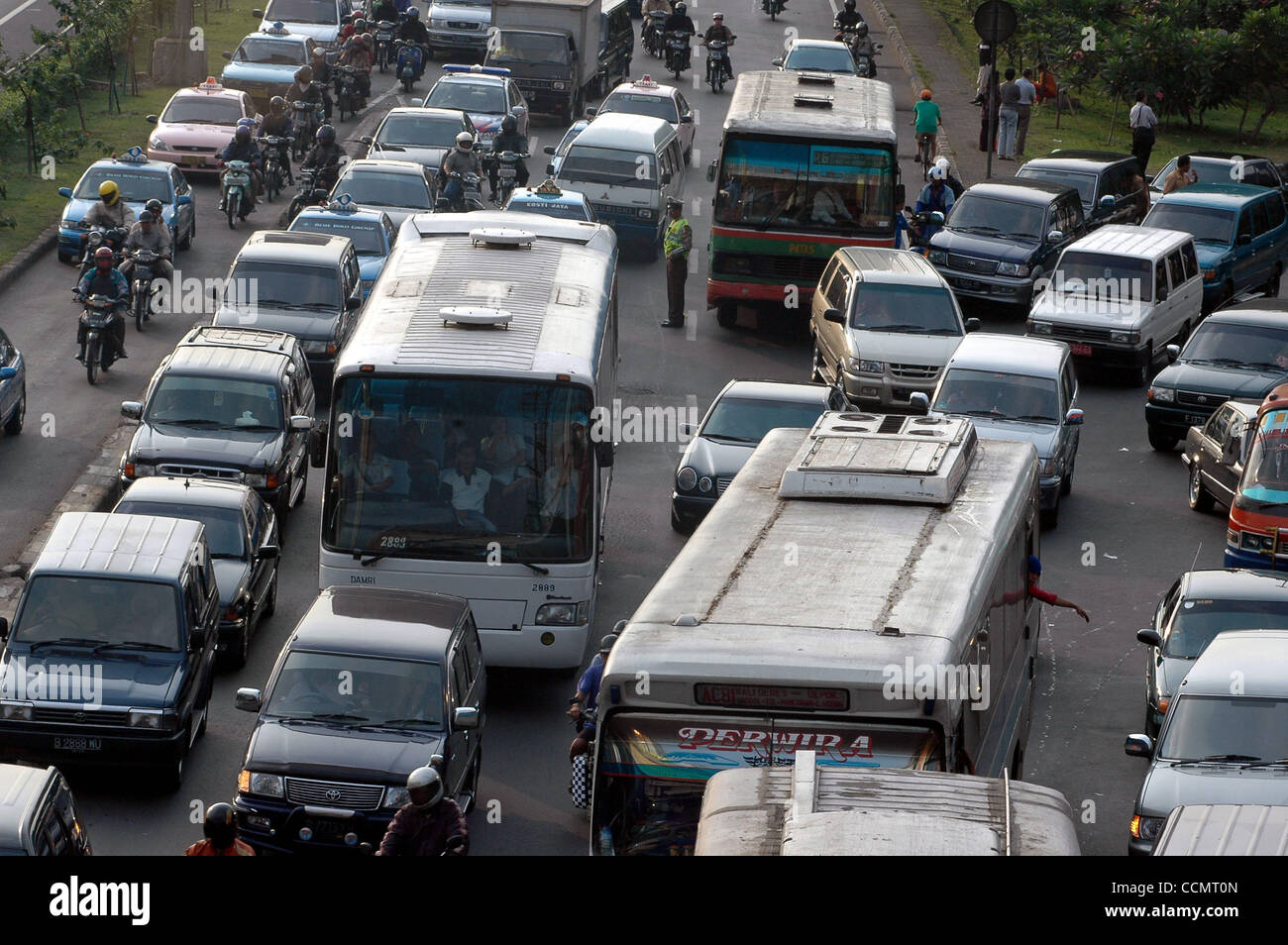 JAKARTA, INDONESIA - JUNE 15, 2004 Atmosphere of traffic that stuck in