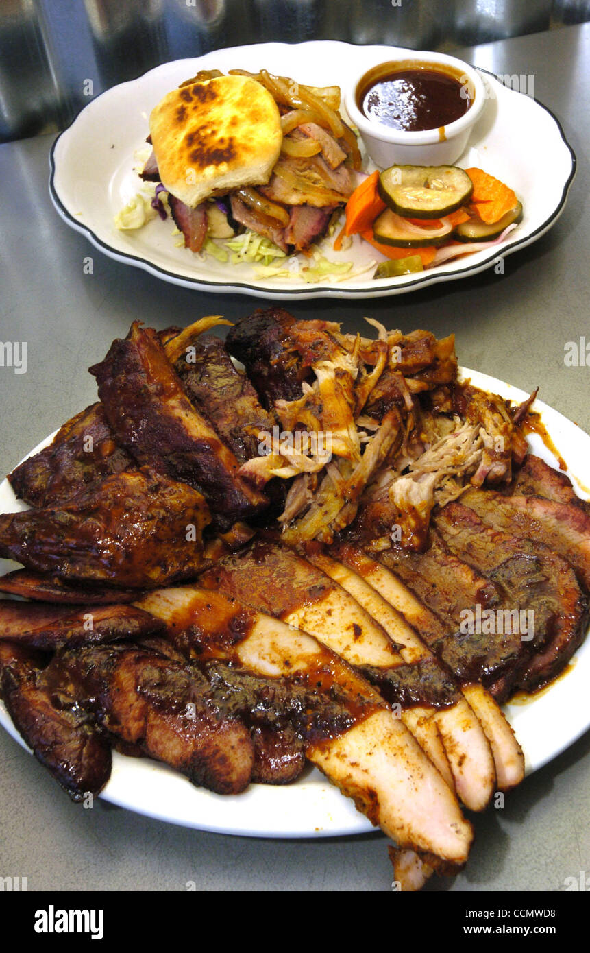 Photo showing the" Big Boy platter" which consists TriTip, chicken, sausage, ribs, and Pulled