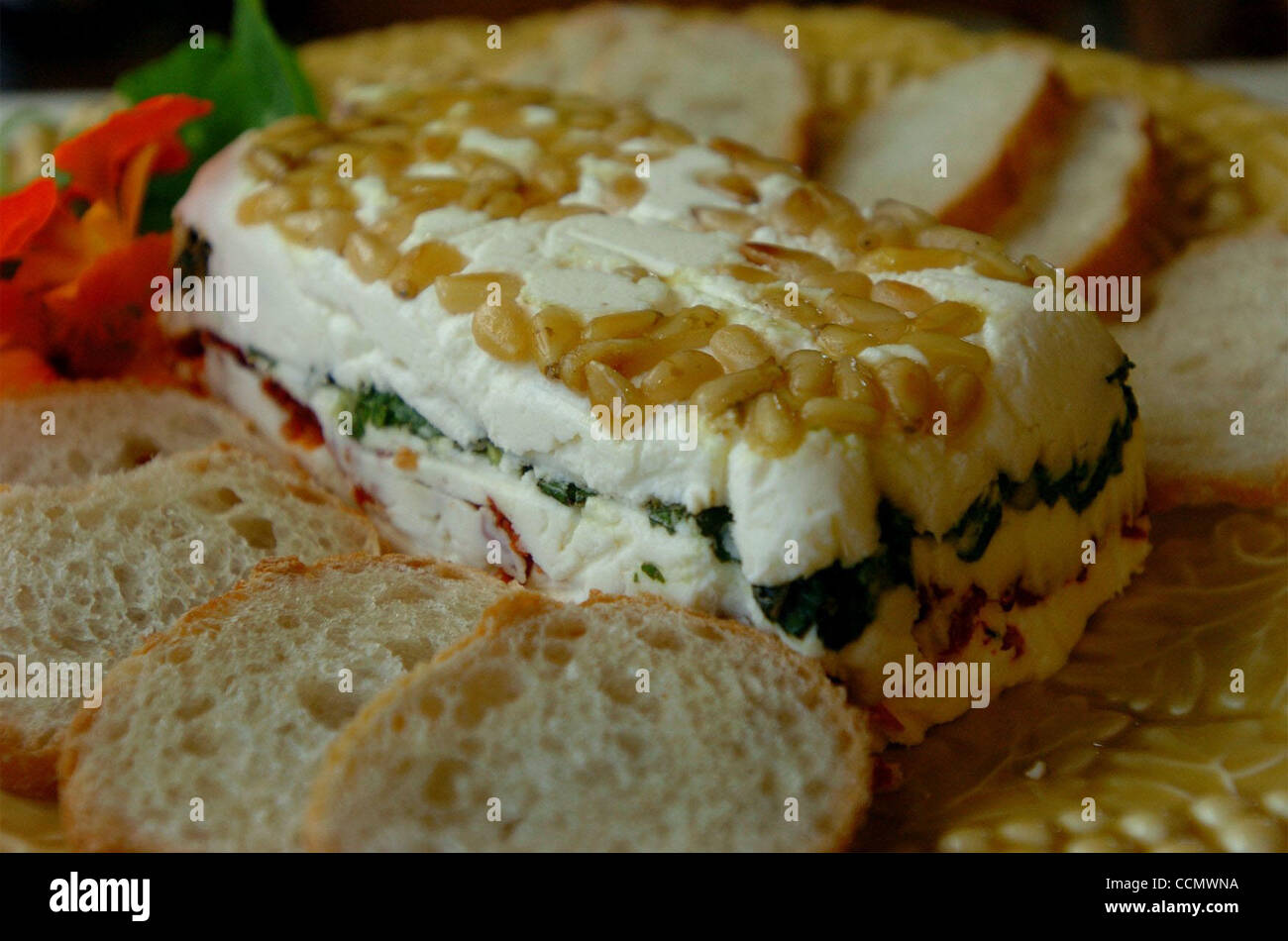 Judy Davis' made up an Italian cheese torte appetizer on Wednesday June 16, 2004 in Fremont