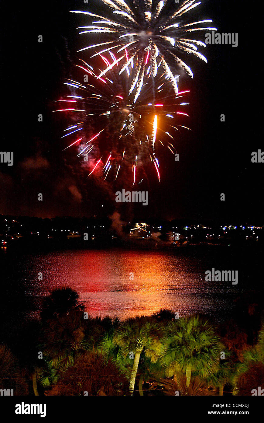 070404StuartFireworks explode from a barge in the St. Lucie River