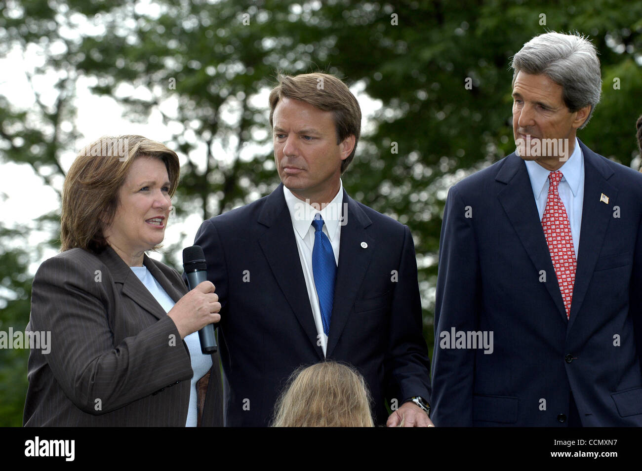 Democratic presidential canidate Sen. JOHN KERRY, D-Mass., center, and ...