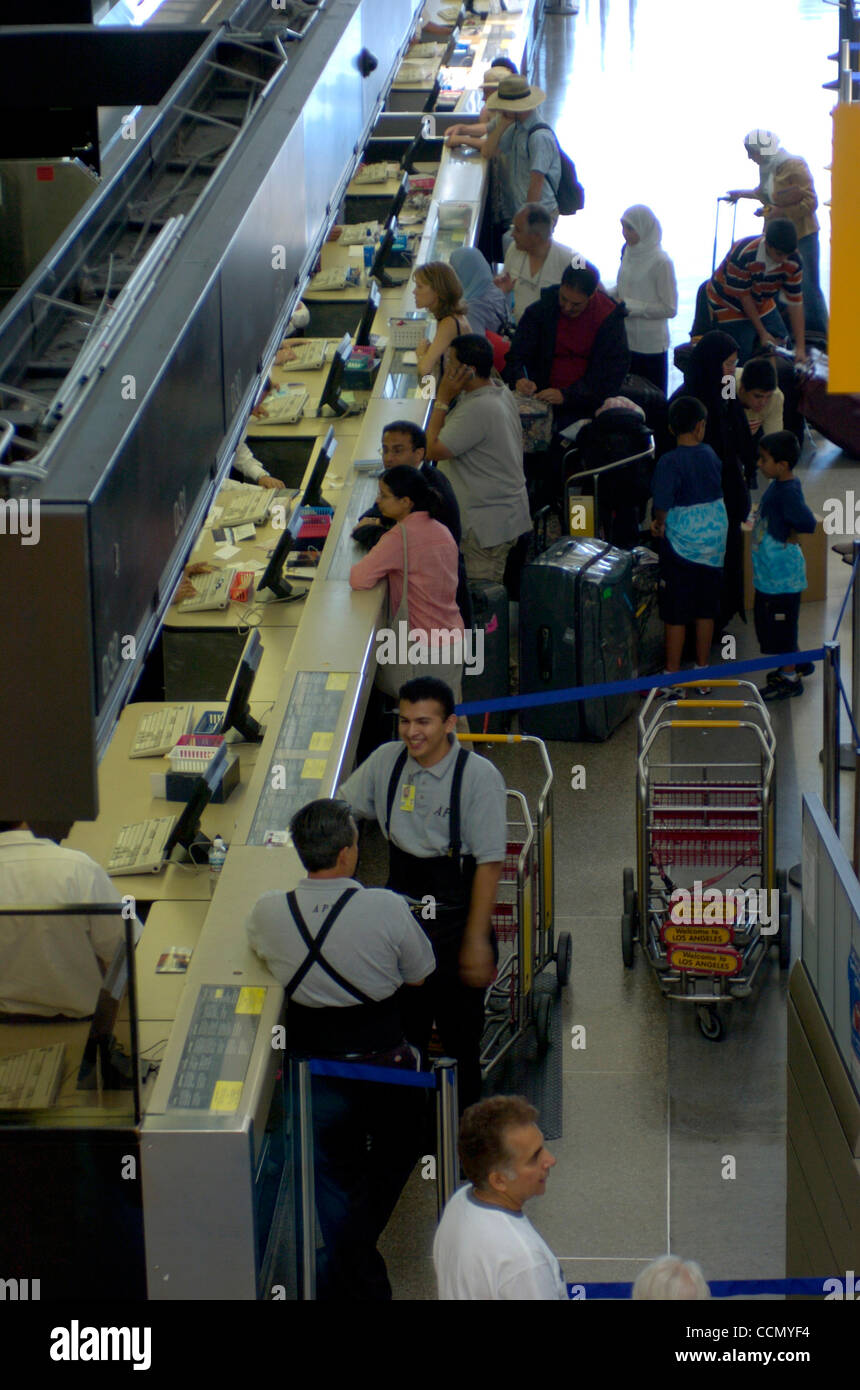 Jul 15, 2004; Los Angeles, CA, USA; The Transportation Security Administration (TSA) institutes a test of it's new Registered Traveller Pilot Program at LAX, which allows registered travellers to bypass the standard security checks, by using a retina scan and a database of travellers who are deemed  Stock Photo