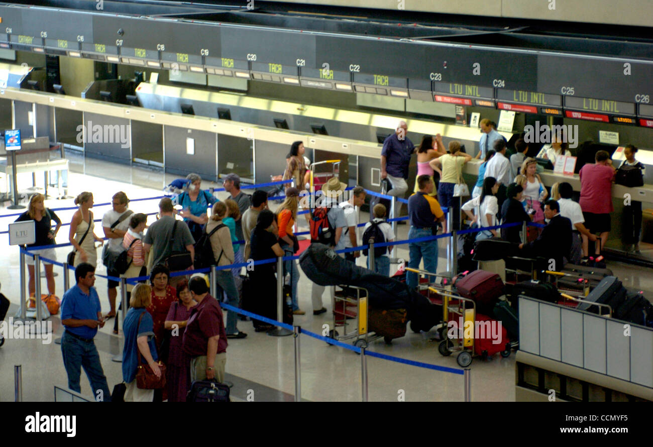 Jul 15, 2004; Los Angeles, CA, USA; The Transportation Security Administration (TSA) institutes a test of it's new Registered Traveller Pilot Program at LAX, which allows registered travellers to bypass the standard security checks, by using a retina scan and a database of travellers who are deemed  Stock Photo