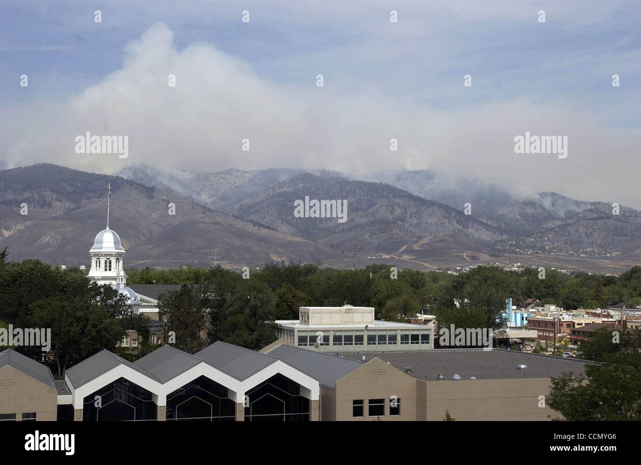 Jul 16, 2004; Carson City, CA, USA; The Waterfall fire continued to burn on the West side of Carson City Friday, July 16, 2004. The fire at one point threatened the Nevada Capitol along the Southern part. Stock Photo