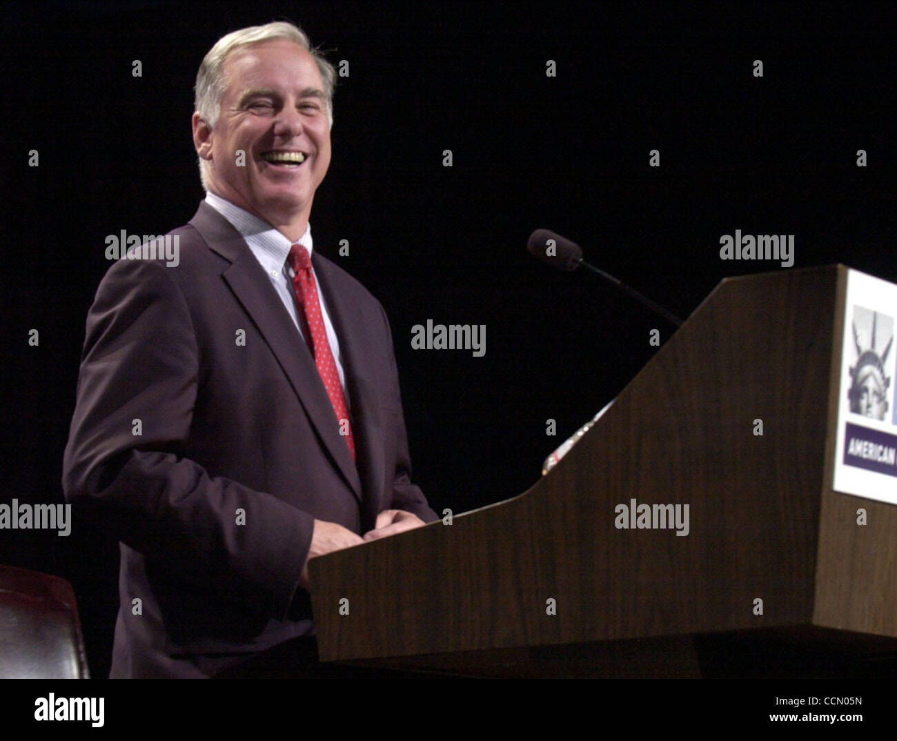 Howard Dean  (former Governor of Vermont, former presidental candidate, and chair of the Democracy for America) laughs at the enthusiastic welcome he receives from ACLU members at the debate with Colorado Governor Bill Owens on Civil Liberties and the Patriot Act at the ACLU National Conference on T Stock Photo