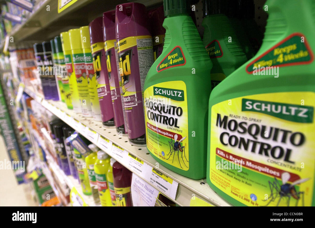 Mosquito-control related products are on display for sale at Yardbirds in Martinez, Calif. on Friday, July 16, 2004.  The West Nile virus scare has caused an increase in sales for mosquito-control devices.  (Contra Costa Newspapers/Tue Nam Ton) Stock Photo