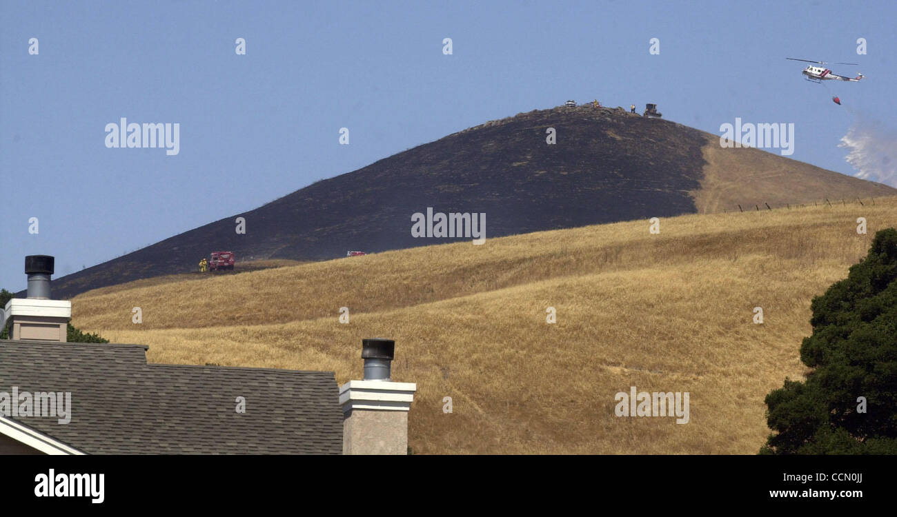 Over 50 acres were burned in a morning grass fire near Schaefer Ranch Road and the Dublin grade